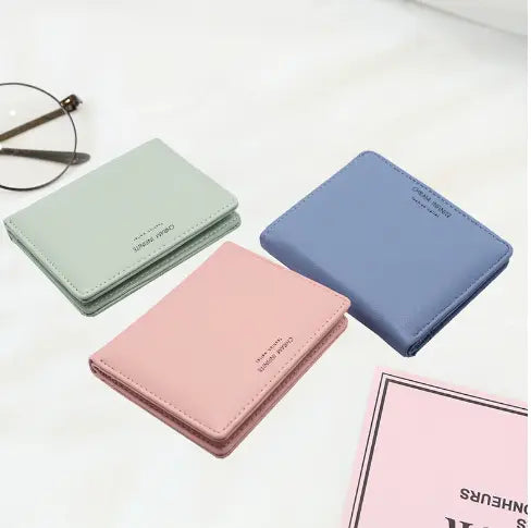 Pastel-colored korean letters slim lightweight wallets in soft mint blush pink and sky blue with subtle embossed branding