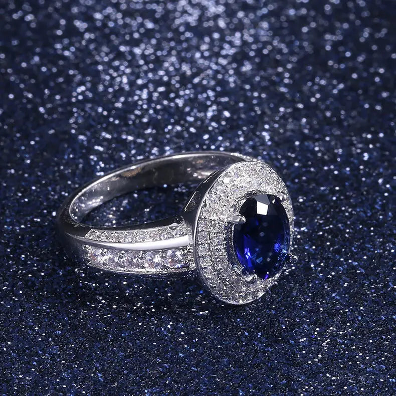 Classic Inlaid Four-claw Sapphire Goddess Ring 1