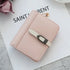 Classic Morandi folding card wallet in delicate pink faux leather with cream and dark gray buckle closure