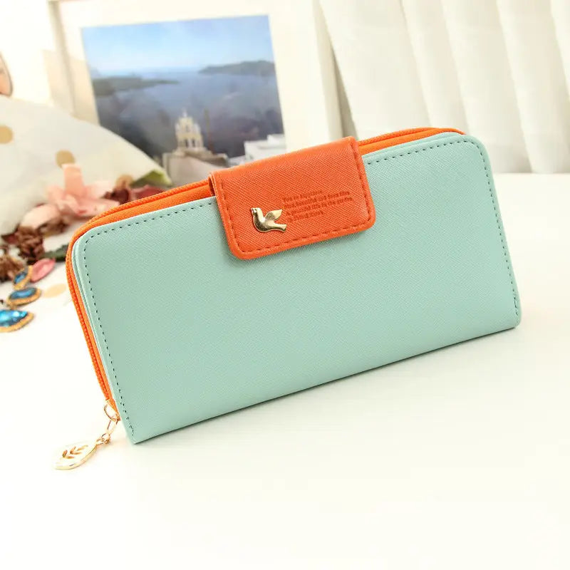 Mint green and orange two-tone designer wallet with bird-shaped metal clasp coin purse phone pouch wallet image