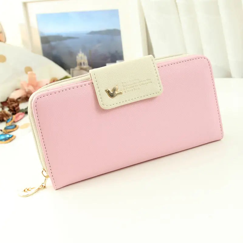 Pink faux leather coin purse wallet with cream flap and gold bird charm designer wallet image for phone pouch