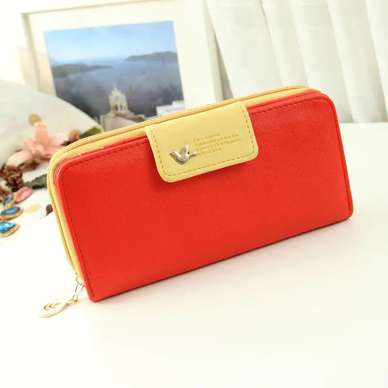 Bright red faux leather long designer wallet with beige flap and bird emblem zipper pull coin purse wallet phone pouch wallet image