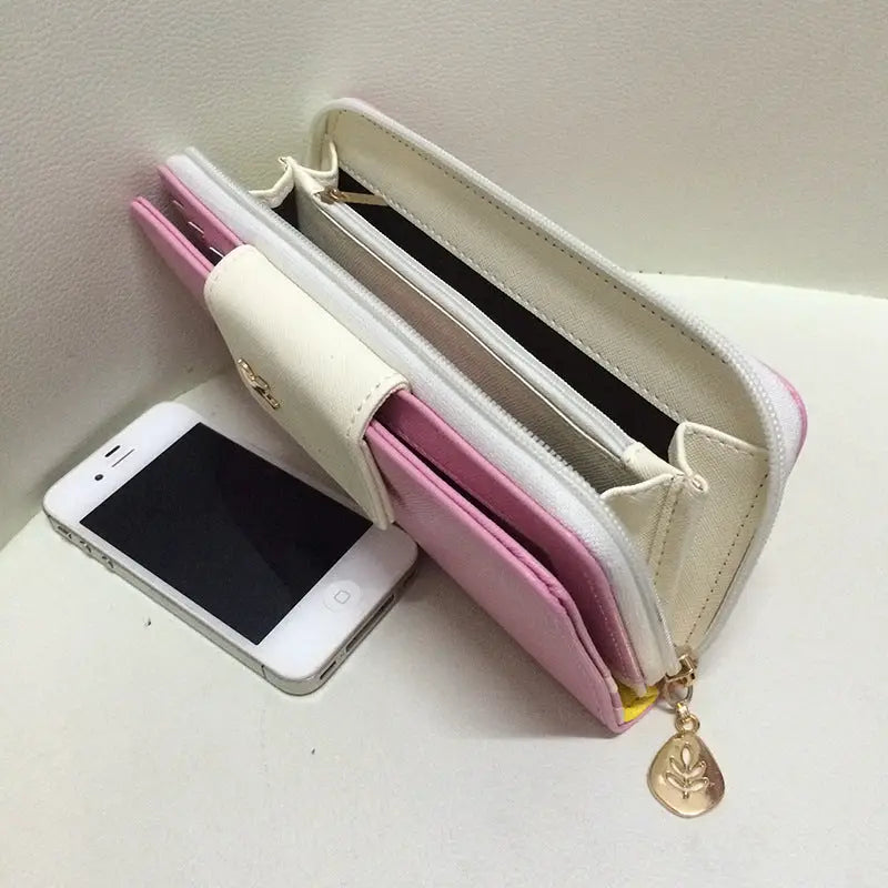 Pink and white zippered coin purse wallet with gold leaf charm designer wallet image for phone pouch use
