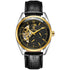 A sleek tevise men’s tourbillon waterproof automatic mechanical watch with black dial gold accents and leather strap