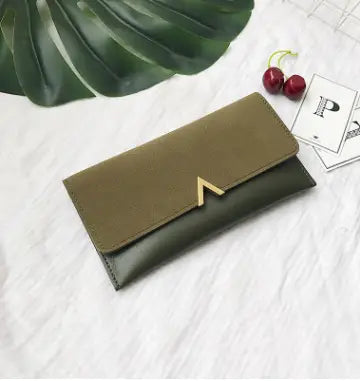 Olive green and black two-tone leather multi-card long wallet with gold-toned triangular clasp long wallet image