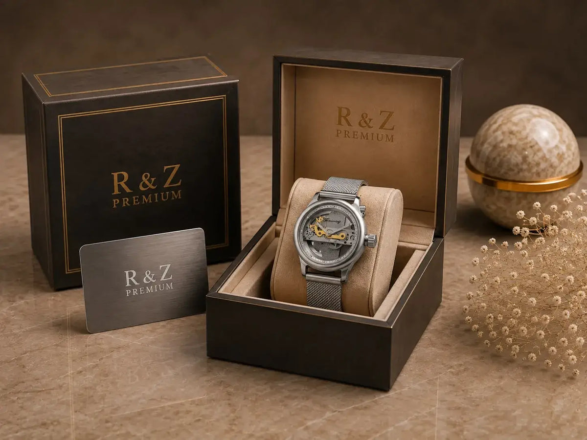 Silver forsining watch with gold-toned gears mesh strap visible inside transparent face in r&z premium box watch image
