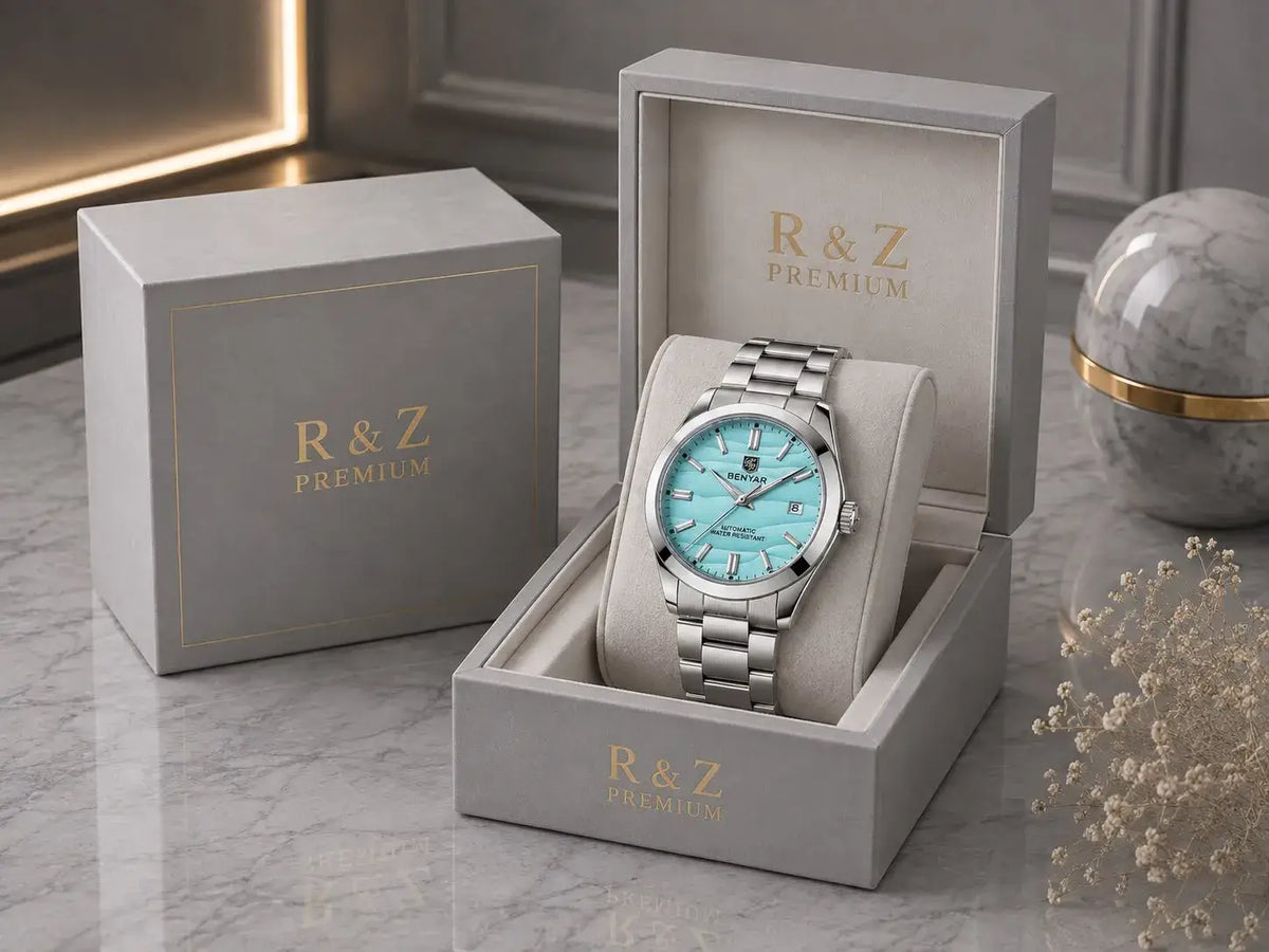 Silver-toned luminous mens mechanical watch with turquoise dial and minimalist markers in r&z packing box