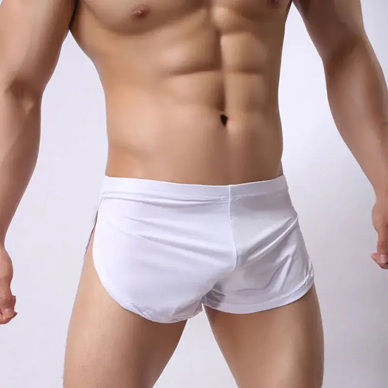 White form-fitting swim trunks with smooth glossy fabric and flat waist wigth for r&z men shorts gyms sport fitness