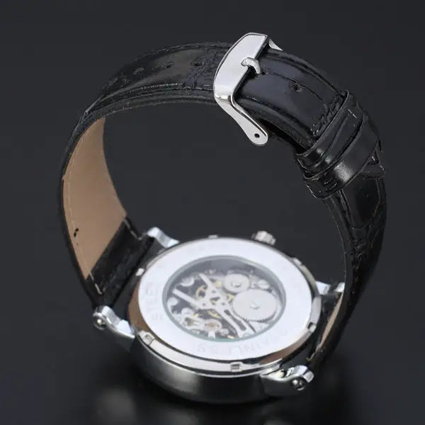 R&Z men’s hollow automatic mechanical watch with black leather strap silver case and exposed skeleton dial gears