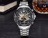 R&Z mens mechanical watch silver-toned skeletonized chronograph with black dial roman numerals and exposed gears