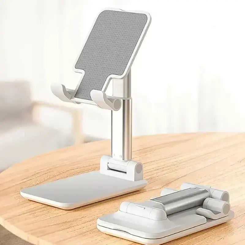 Silver and white foldable iphone desktop tablet stand with textured gray grip surface for universal tablet holder