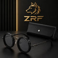 Black round-framed glasses with metallic hinge and studded detailing beside matching black leather case from r&z wolfs gaze