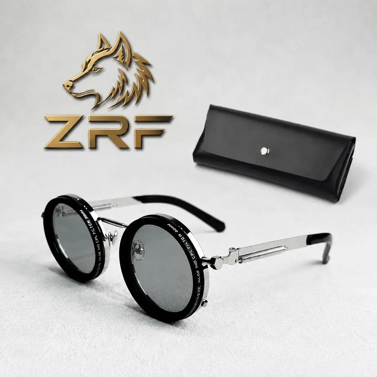 Black-framed round sunglasses with silver metal arms and wolf logo from r&z the wolfs gaze command every look collection